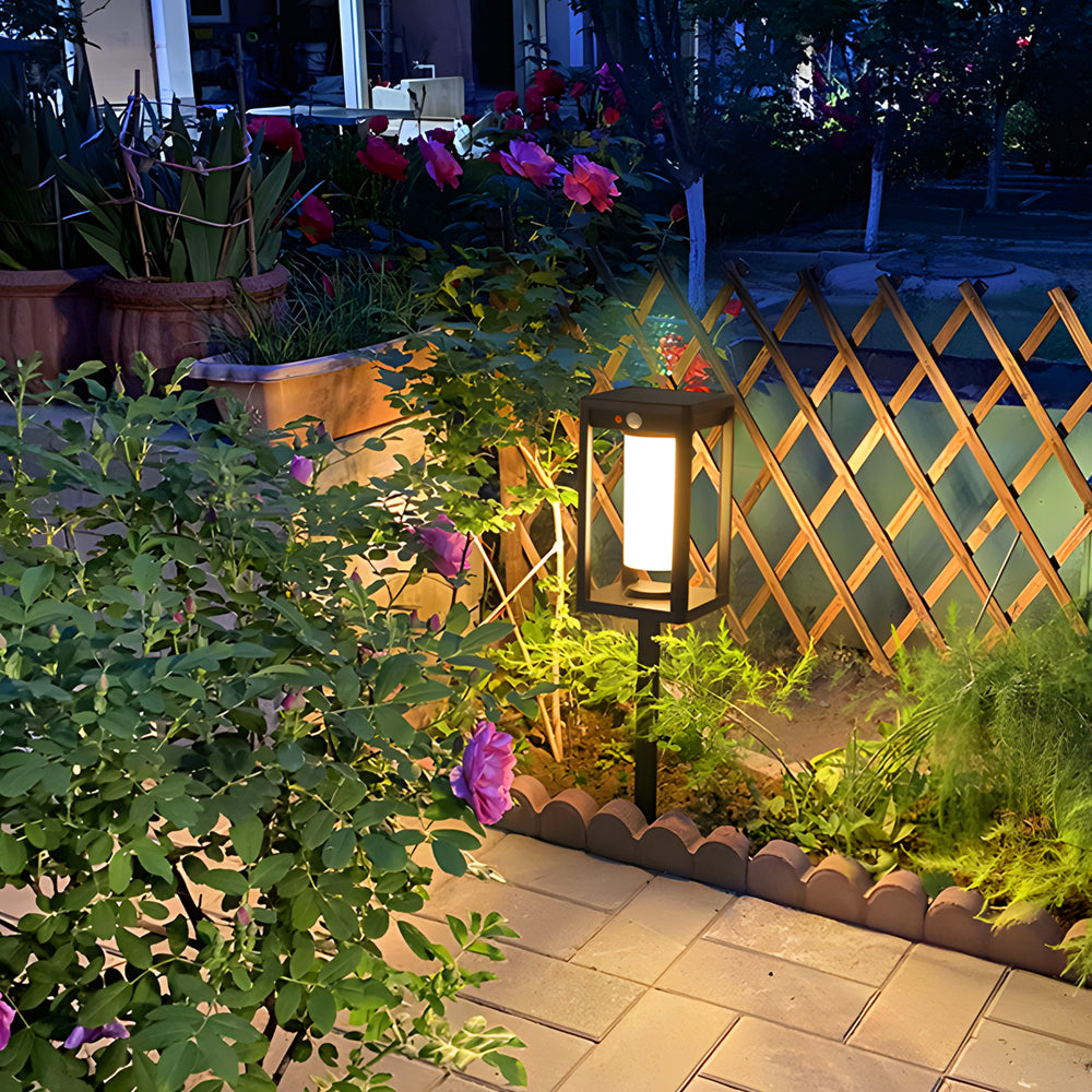 Colorful flower garden pathway enhanced with warm LED lantern lighting and decorative trellis elements