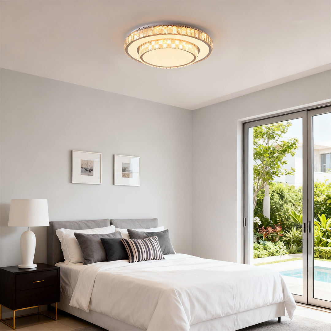 Modern flush mount ceiling LED light adding elegance to a neutral bedroom.