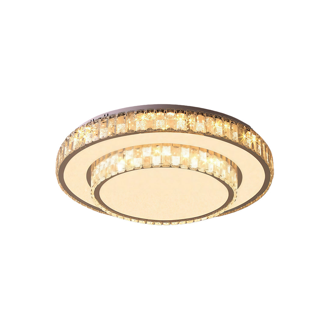 Luxurious circular flush mount ceiling LED light with crystal accents and gold trim.
