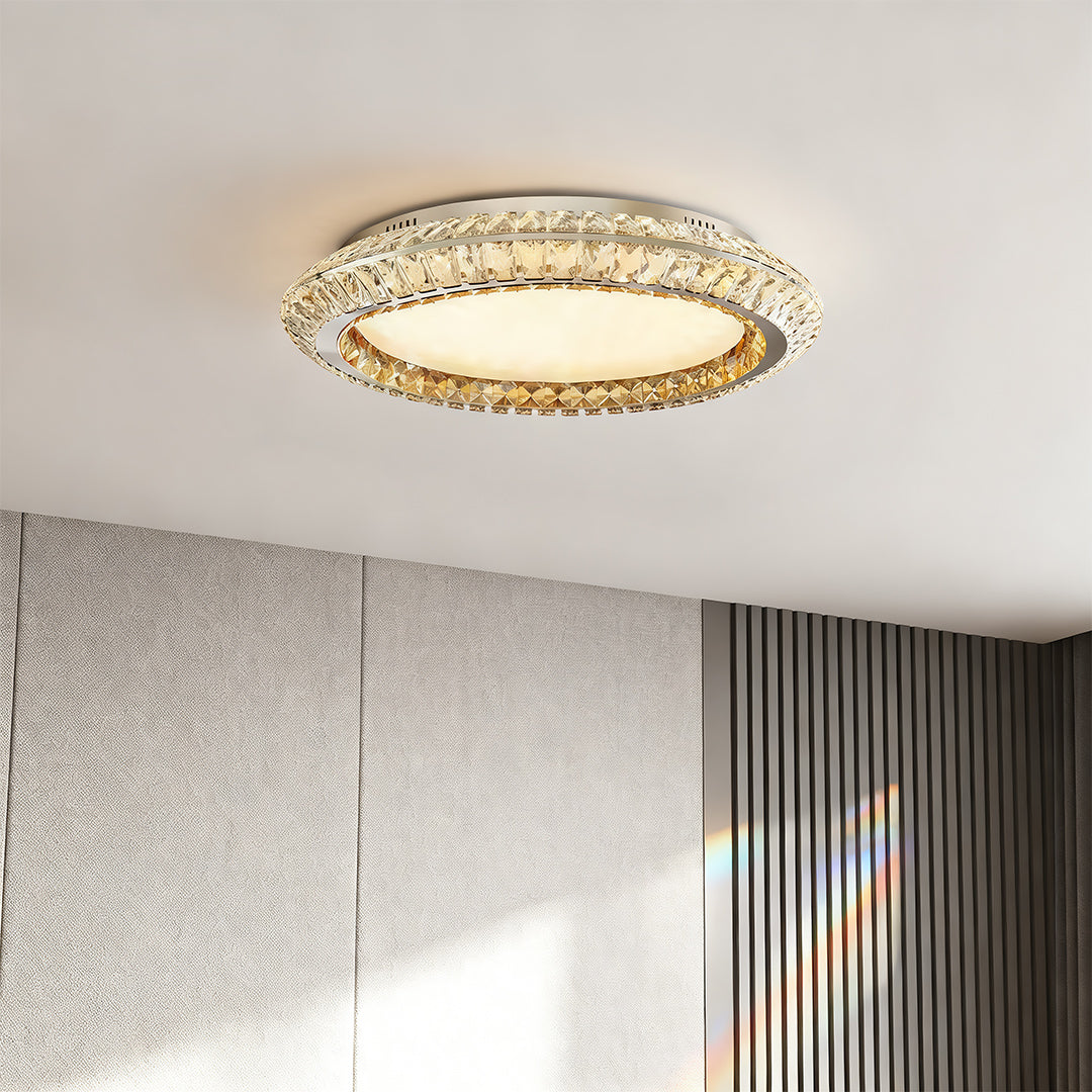 Flush mount crystal ceiling light in a bedroom with neutral tones, offering a luxurious feel.
