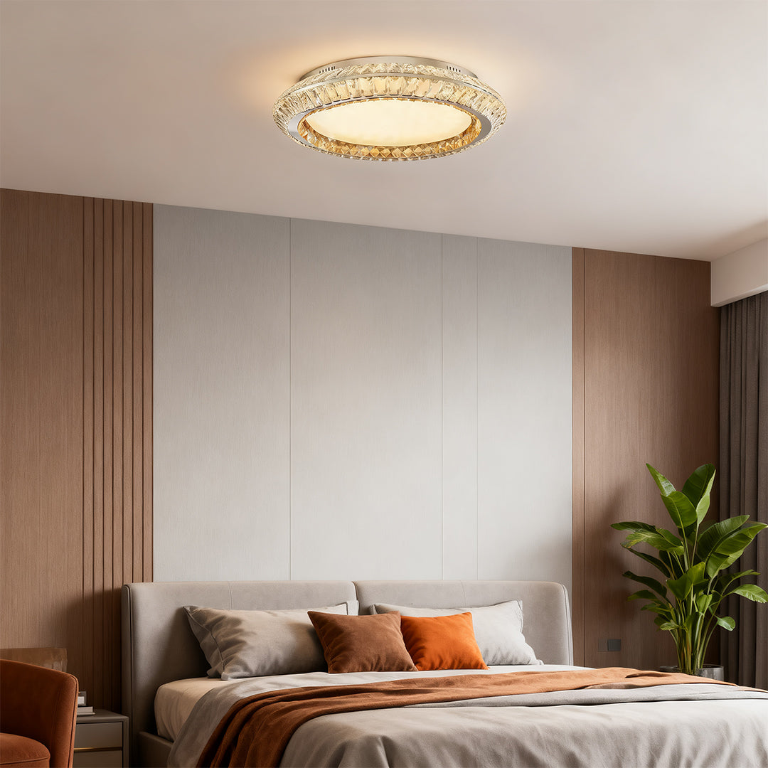Flush mount crystal ceiling light in a minimalist bedroom, adding a touch of elegance to the space.