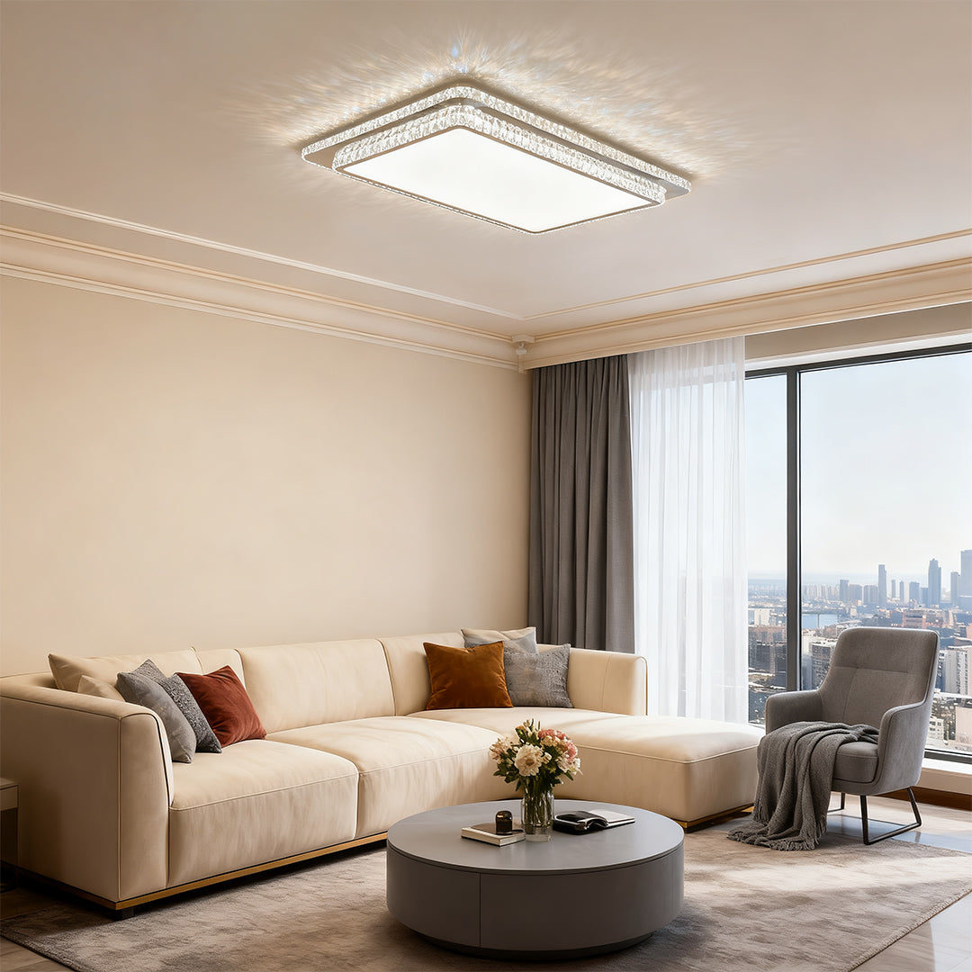 Flush mount crystal light fixture illuminating a cozy modern living room.