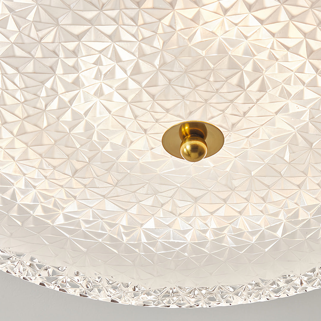 Bottom view of flush mount dome light showing intricate textured glass pattern detail