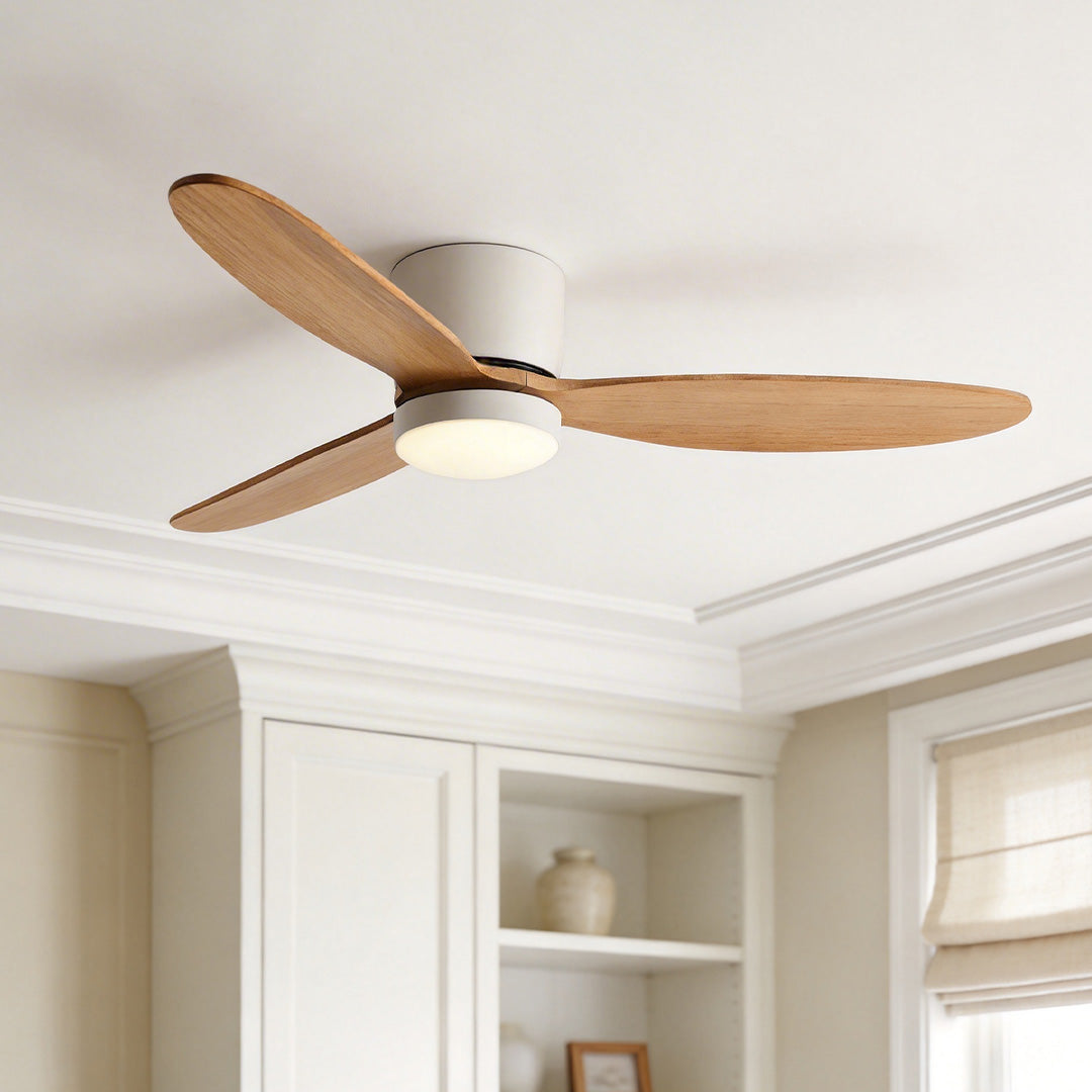 flush mount natural wood ceiling fan with light in a bedroom