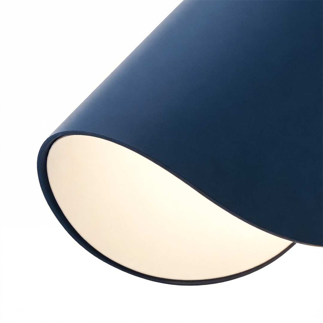 Folding wall sconce in black providing elegant illumination for a contemporary space.