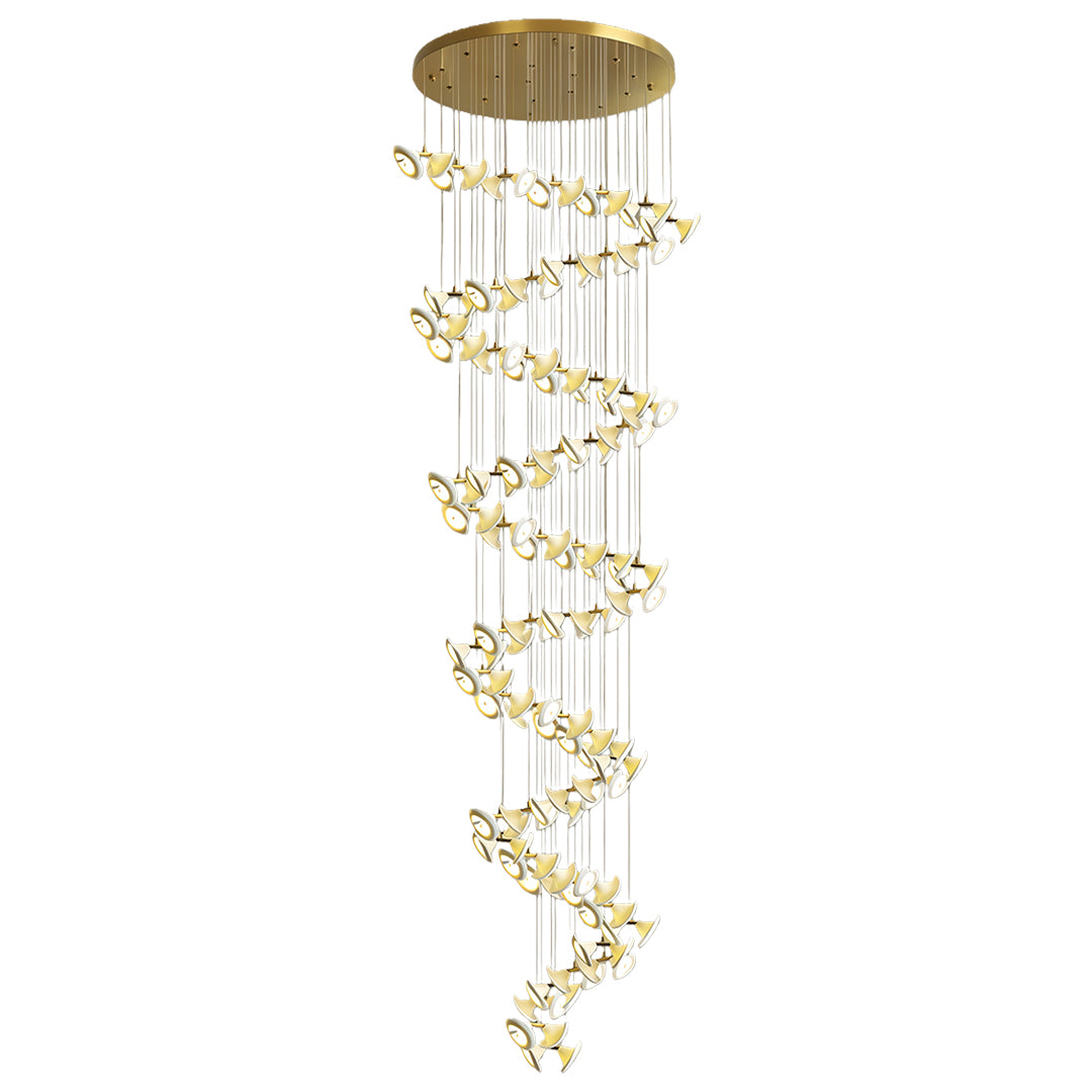 Modern brass chandelier with spiral lights installed in a foyer.