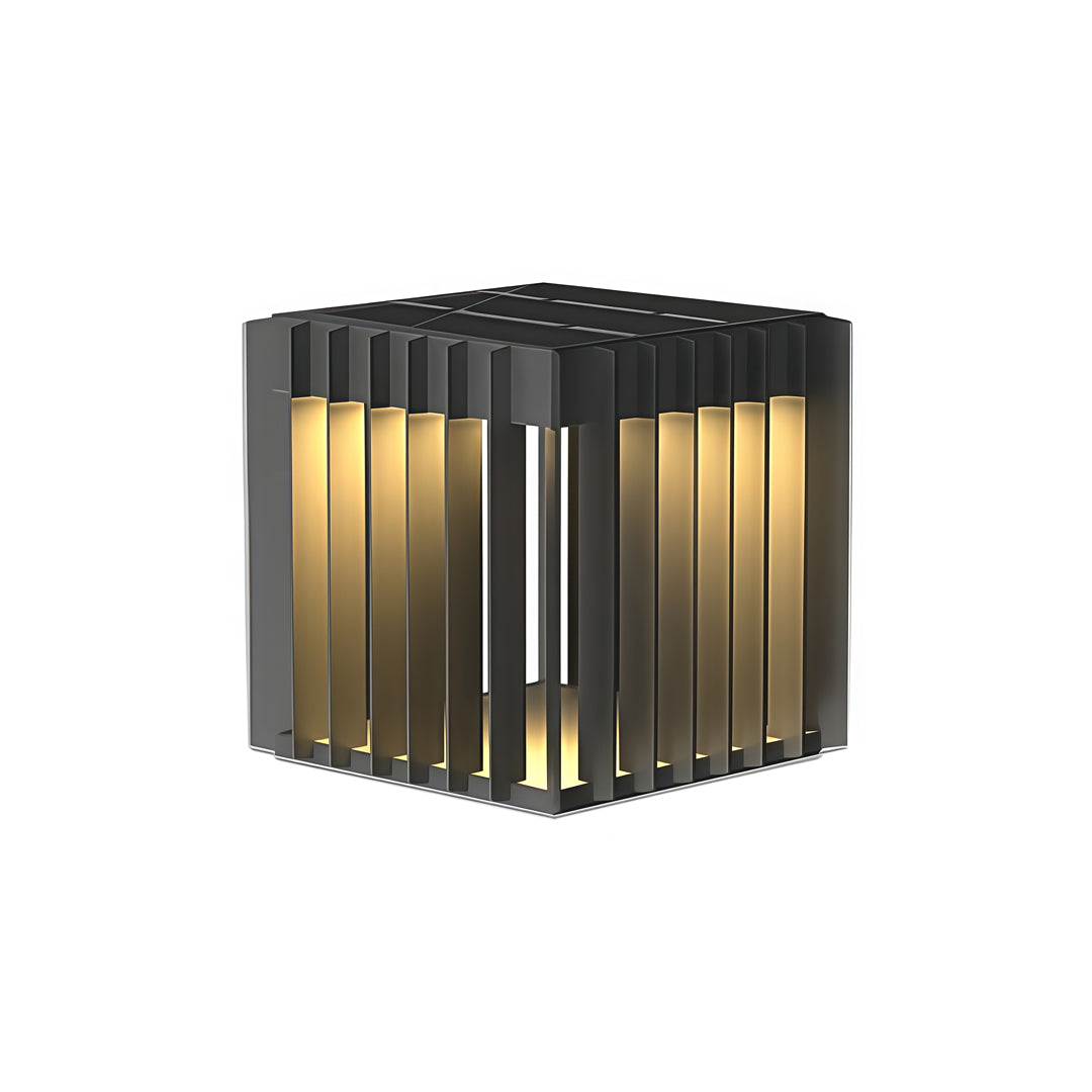 Compact cube front pillar lights emitting warm symmetrical illumination through black slatted frames.