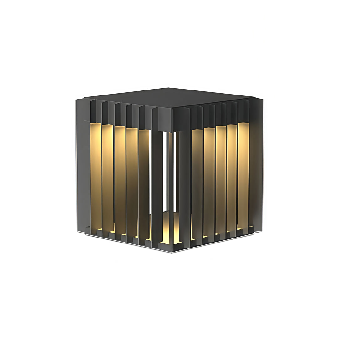 Modern cube-shaped black front pillar lights with vertical slats and warm internal glow.