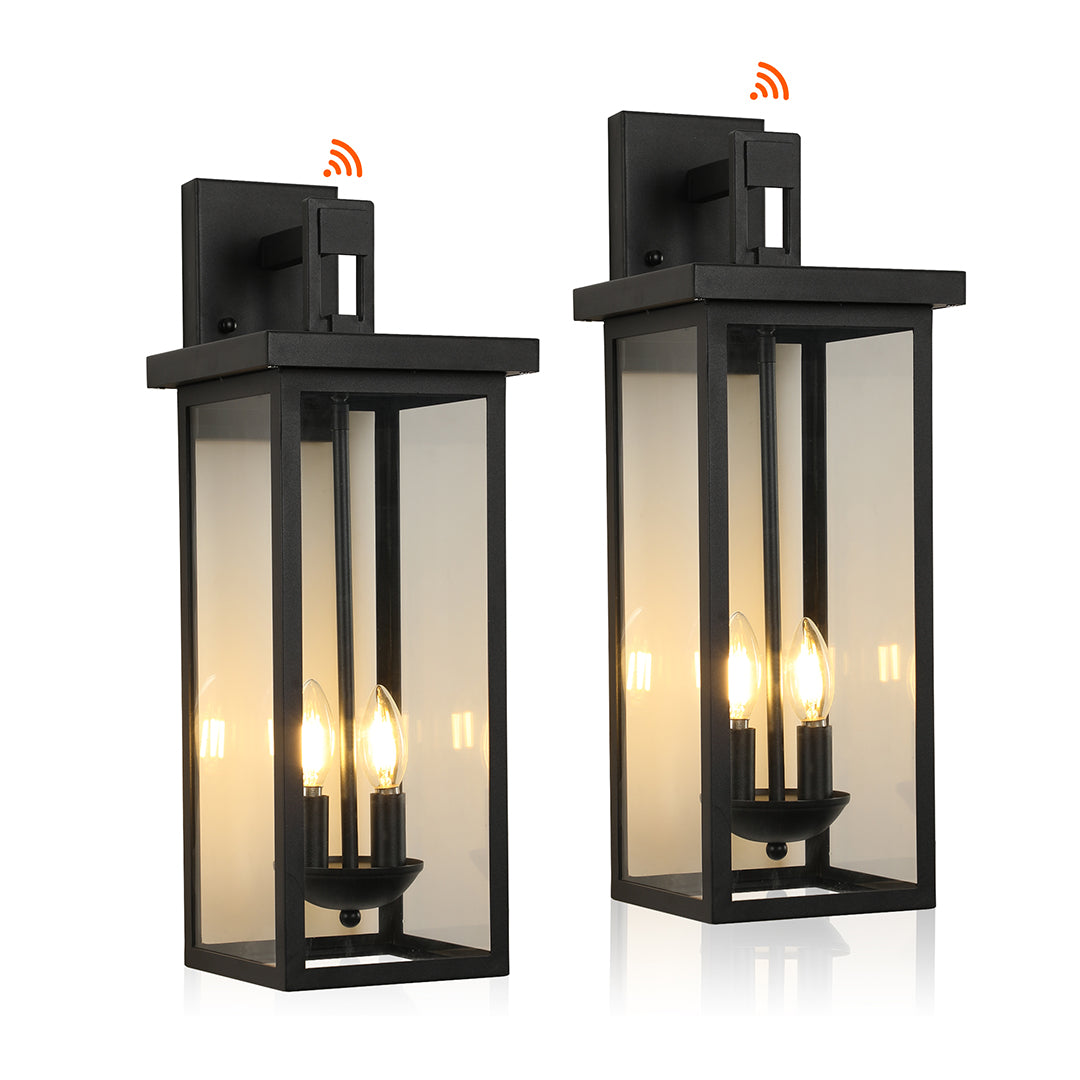 Pair of black external wall lights with frosted glass, ideal for symmetrical outdoor lighting installations.