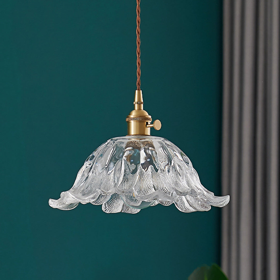 Decorative flower pendant lighting with frosted glass petals creating soft diffused ambient lighting.