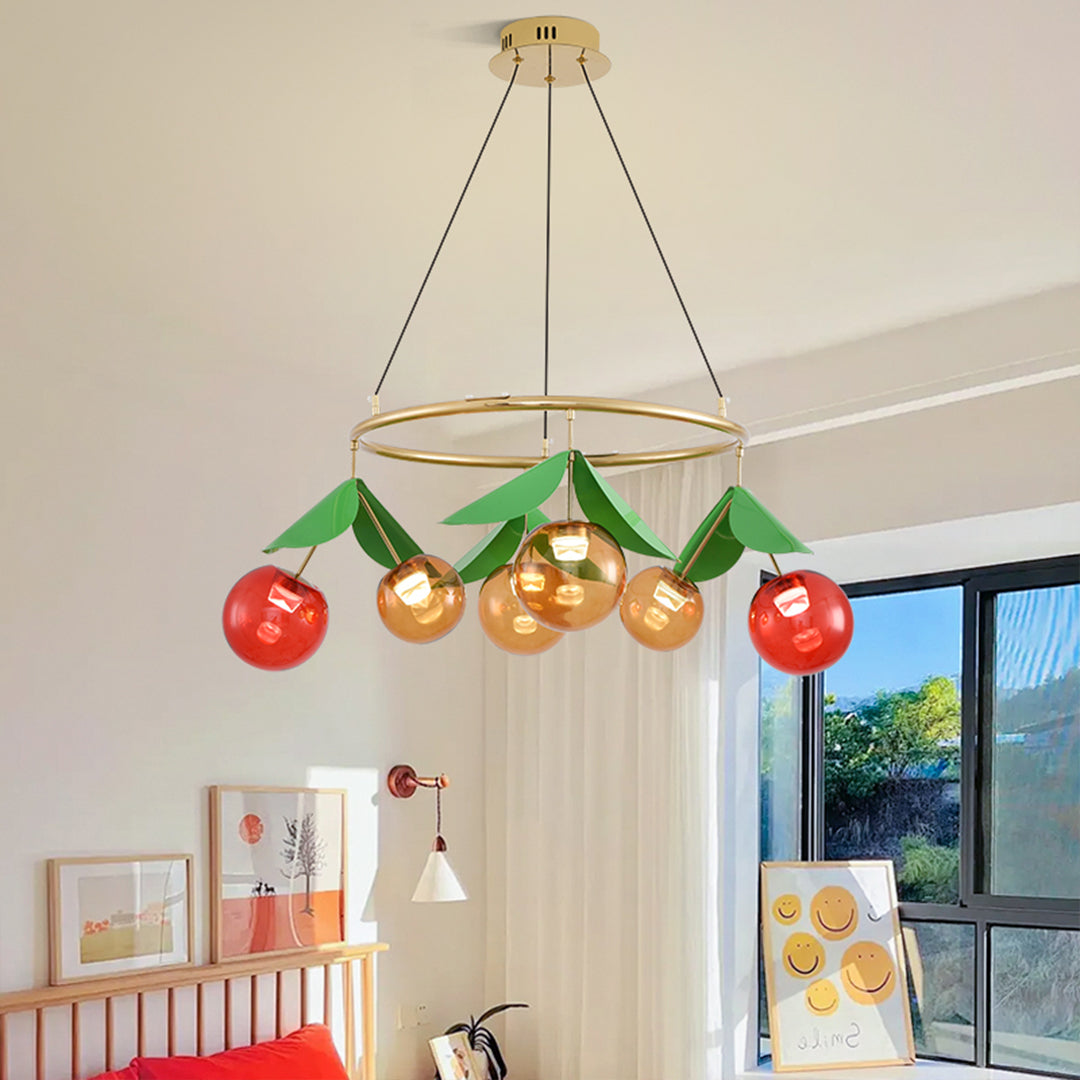 Playful fruit-themed lighting fixture suspended in modern children's room with colorful furniture and toys