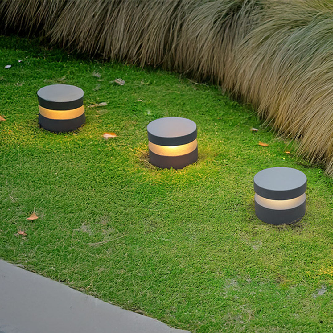 110v landscape lights arranged in garden setting providing warm ambient lighting for outdoor space