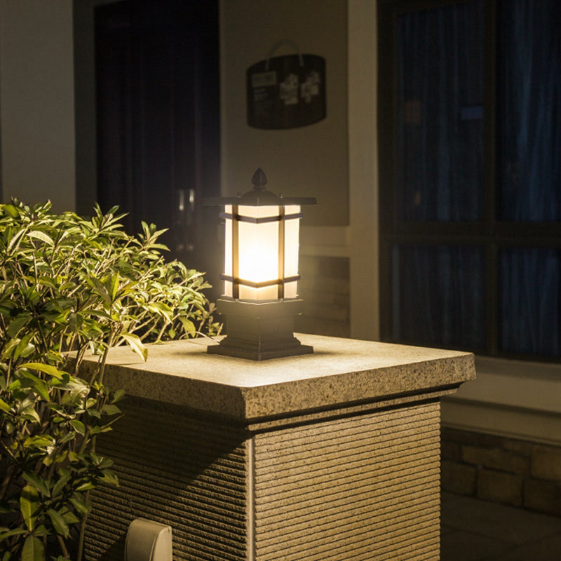 Garden bollard lighting providing soft light along a brick walkway.