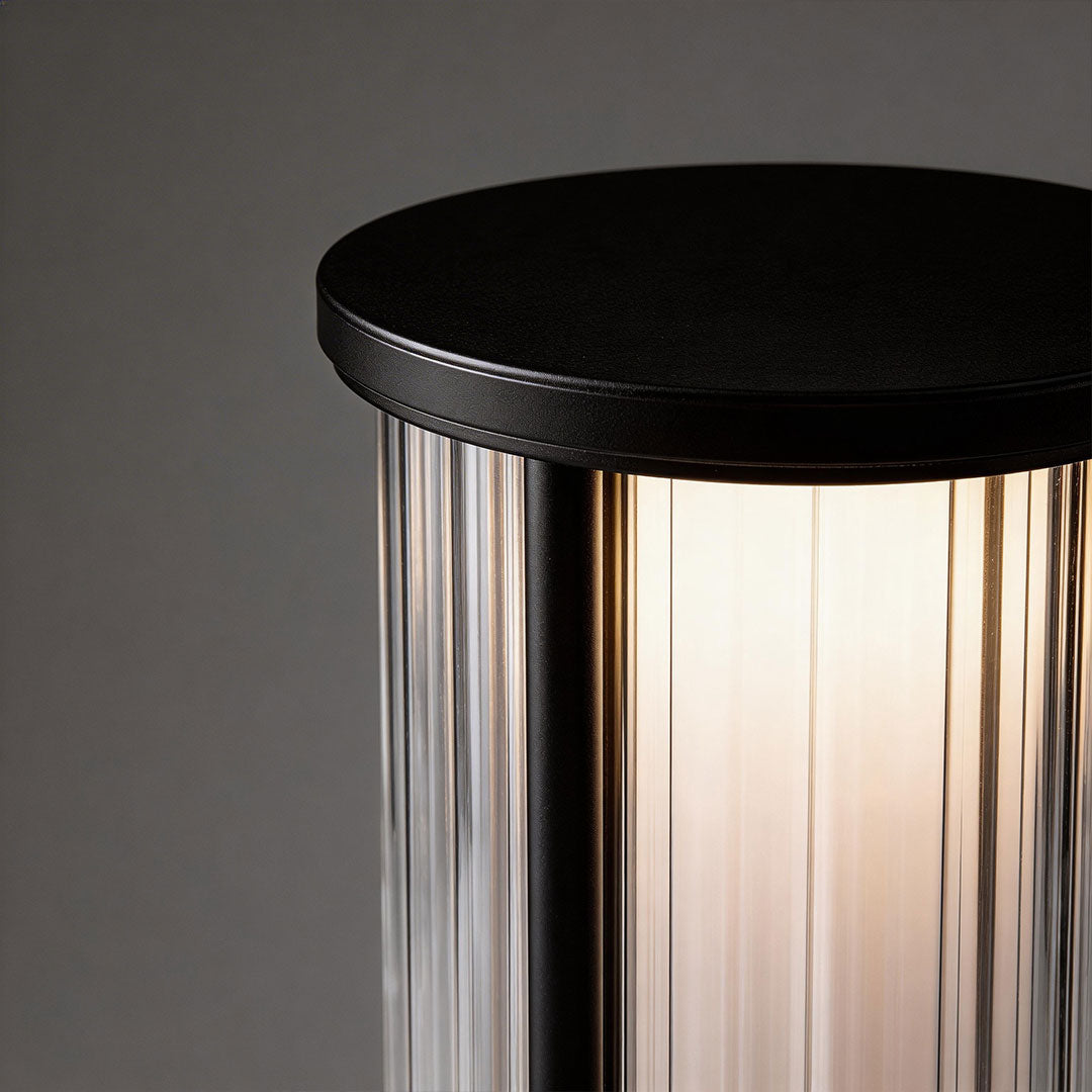 Close-up of garden bollard lighting showcasing its transparent and durable design.