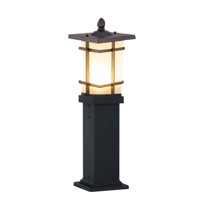 Garden bollard lighting with a close-up of its sleek black and illuminated design.