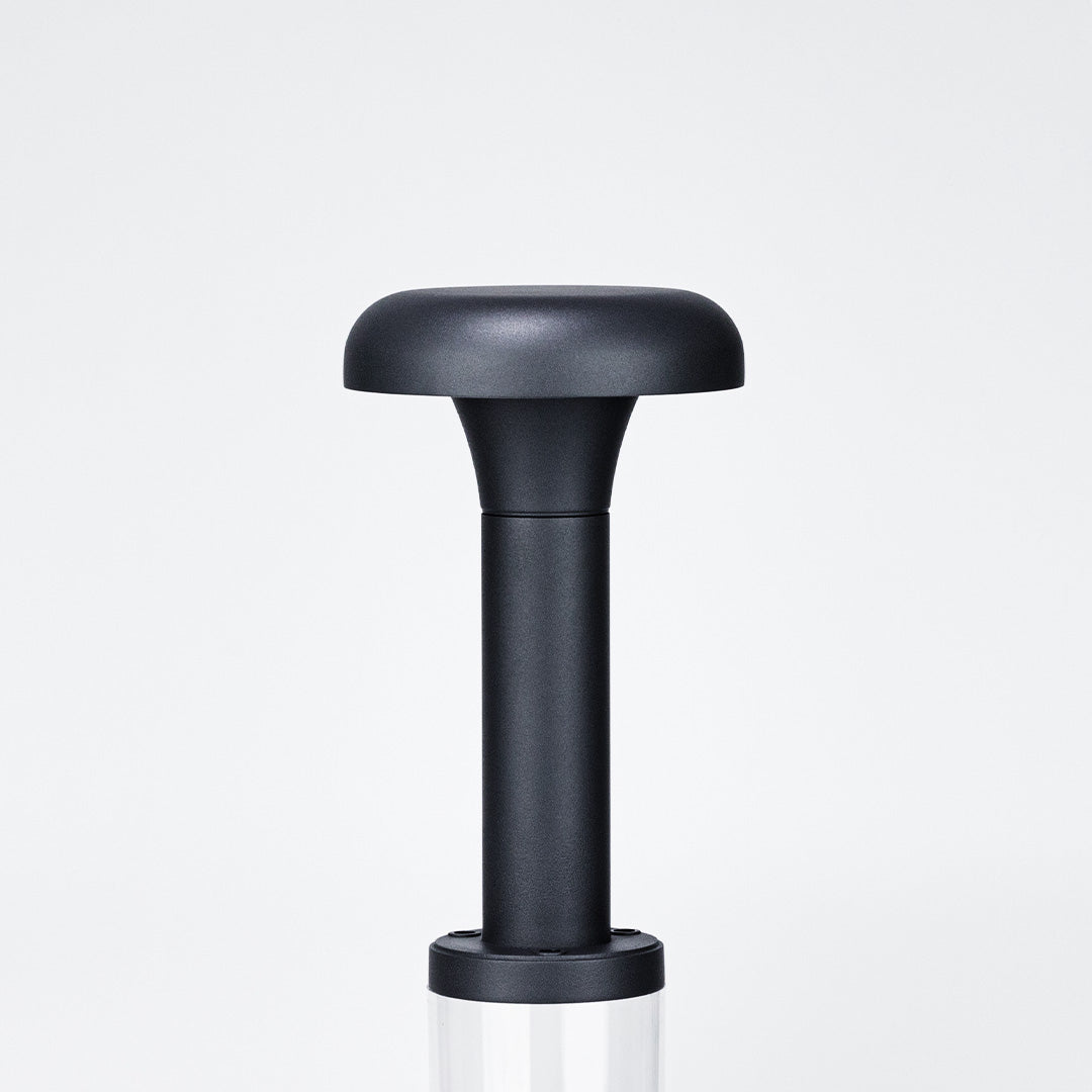 Garden led lights product close-up showing a minimalist black bollard design suitable for contemporary outdoor landscapes.