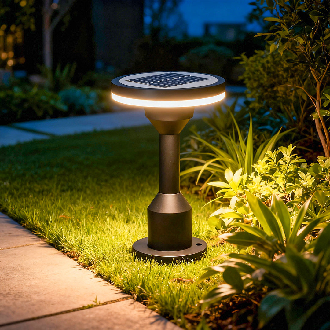 round-head garden path lighting post lighting up landscaped yard at night