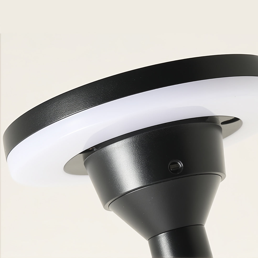 close-up of modern garden path lighting head with ring-shaped LED design