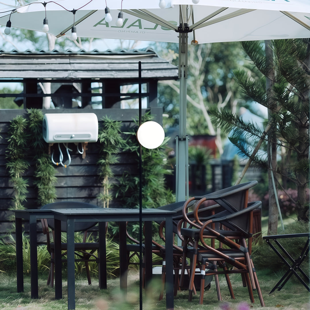 A garden walkway surrounded by plants and illuminated by bright pathway lights, providing vibrant and stylish garden pathway lighting.