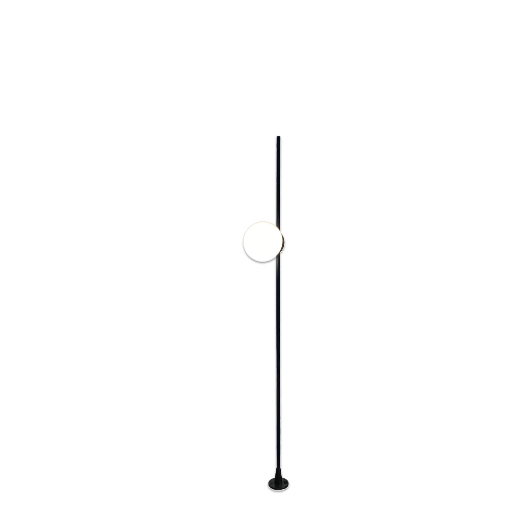 A single tall and slim black outdoor post light delivering focused garden pathway lighting with a clean minimalist style.