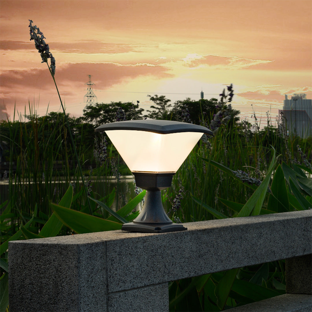 Contemporary post lights providing guidance lighting along modern walkway and landscaping