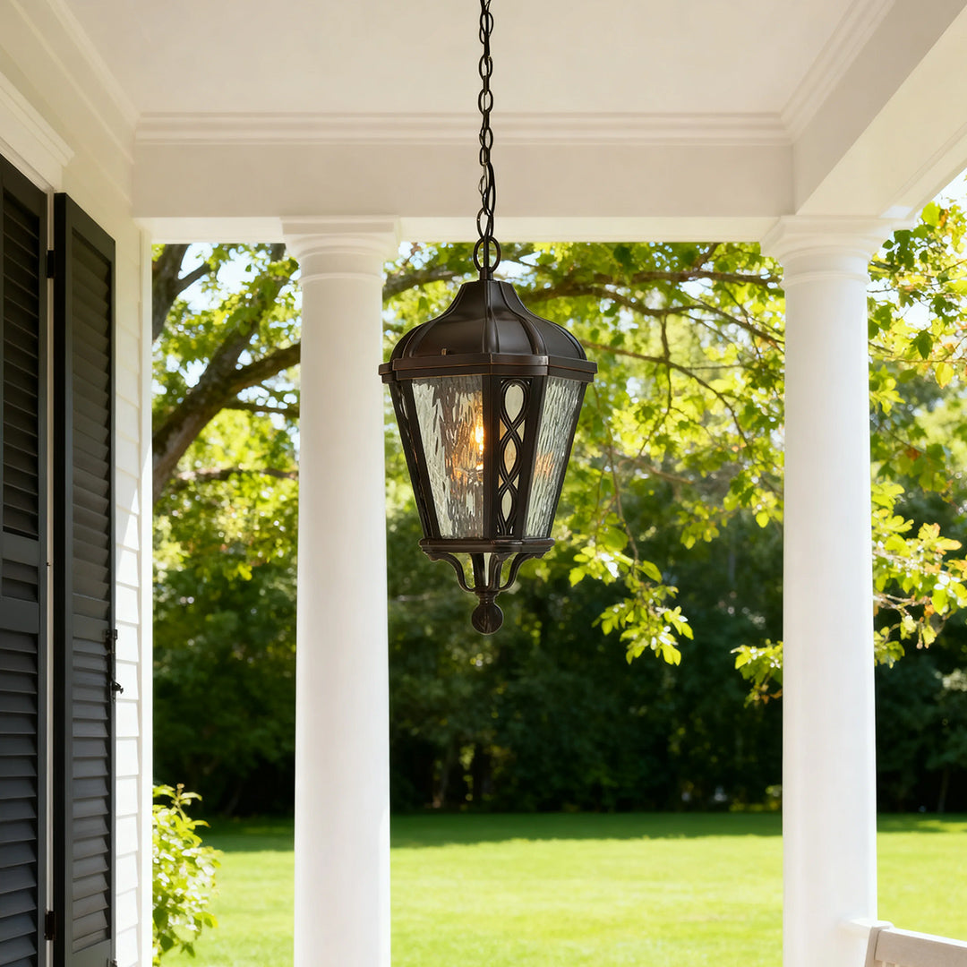 Black pendant light in a garden patio, elegant and functional outdoor lighting