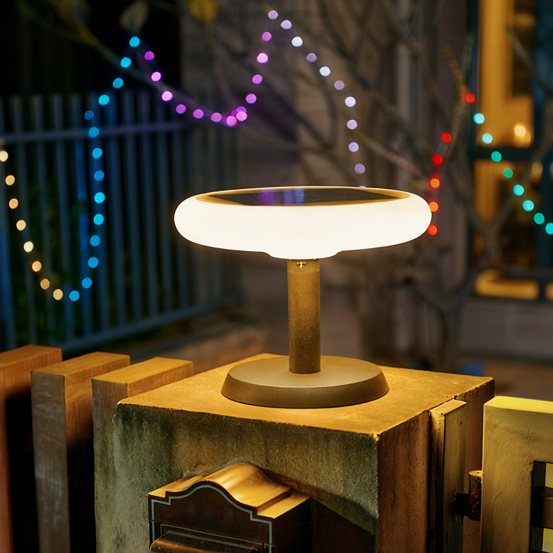 Solar LED post light in a garden setting, elegant and eco-friendly outdoor lighting fixture