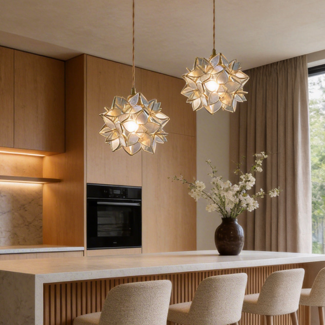 Gardenia pendant light enhancing a contemporary dining area with elegant directional light.