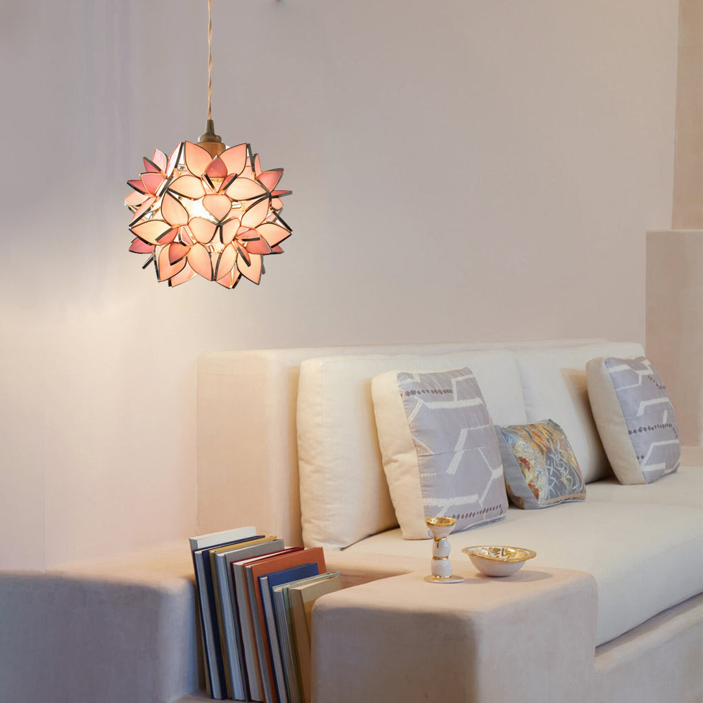 Gardenia pendant light enhancing a cozy bedroom corner with warm light.