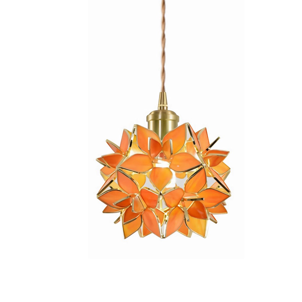 Gardenia pendant light in orange providing a warm glow in a contemporary setting.