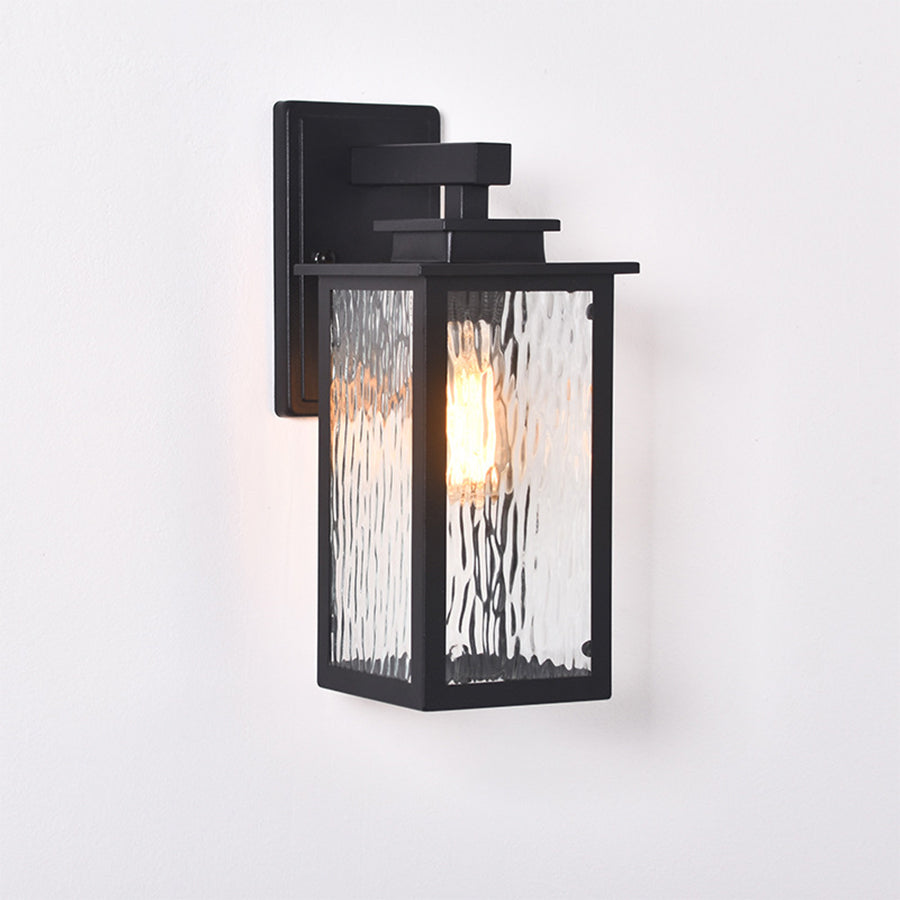 Modern black exterior wall light with geometric design and clear glass panels