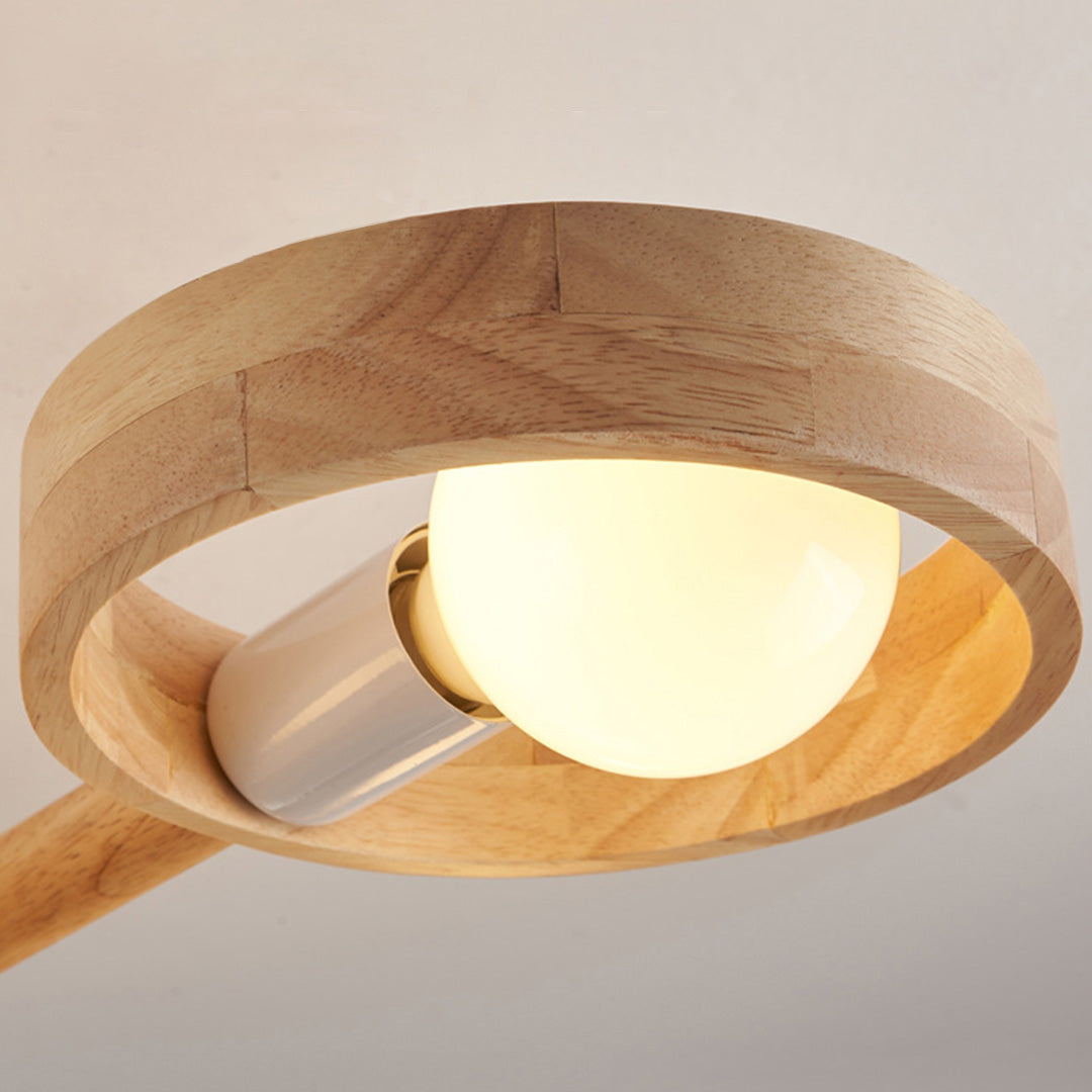 Geometric pattern view of brass glass shade chandelier with wall light circular arrangement