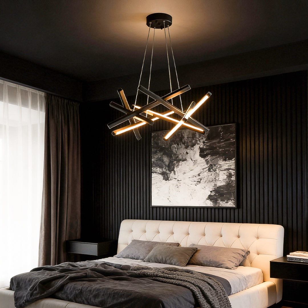 Modern geometric ceiling light with layered linear LEDs hanging above a bedroom, providing dramatic lighting and a bold architectural accent.