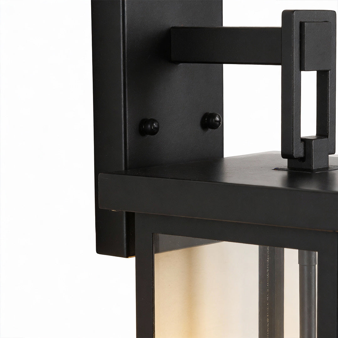 Modern black external wall lights featuring geometric frame design and sturdy metal construction, ideal for contemporary outdoor spaces.