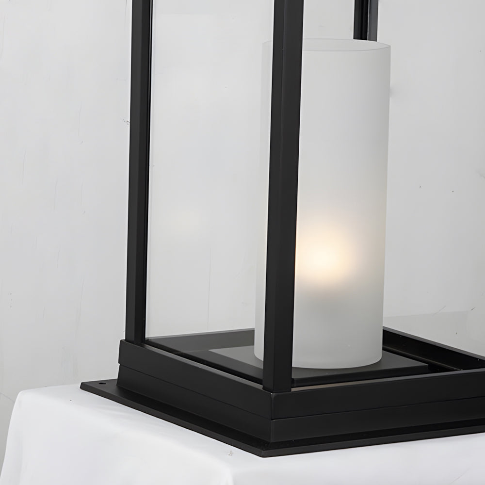 Silver Metal Table Lamp black metal lantern with clean geometric lines and frosted glass panels on white background