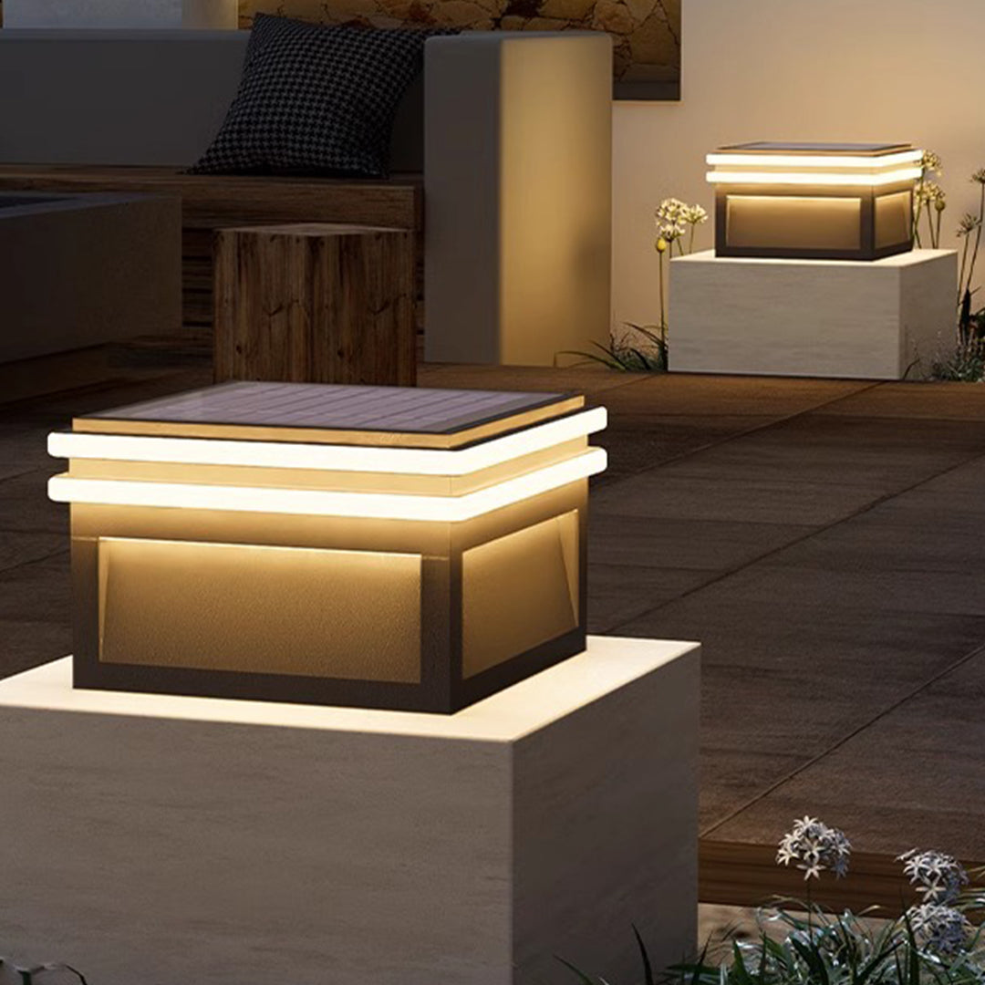 Alternative angle of rectangular metal pillar lights highlighting the modern geometric form and LED integration