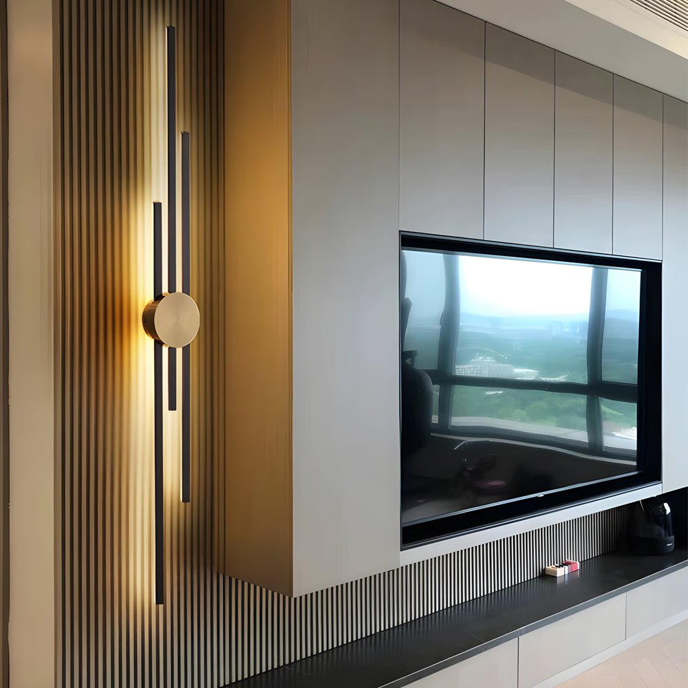 Linear wall sconce with a geometric, modern design and elegant gold accents, perfect for illuminating living rooms or hallways.