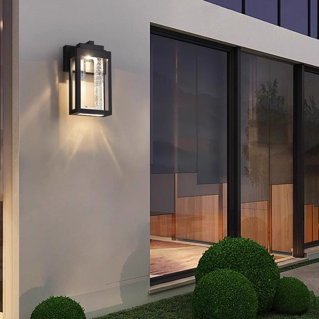 Modern outdoor wall sconce with geometric design mounted on contemporary building