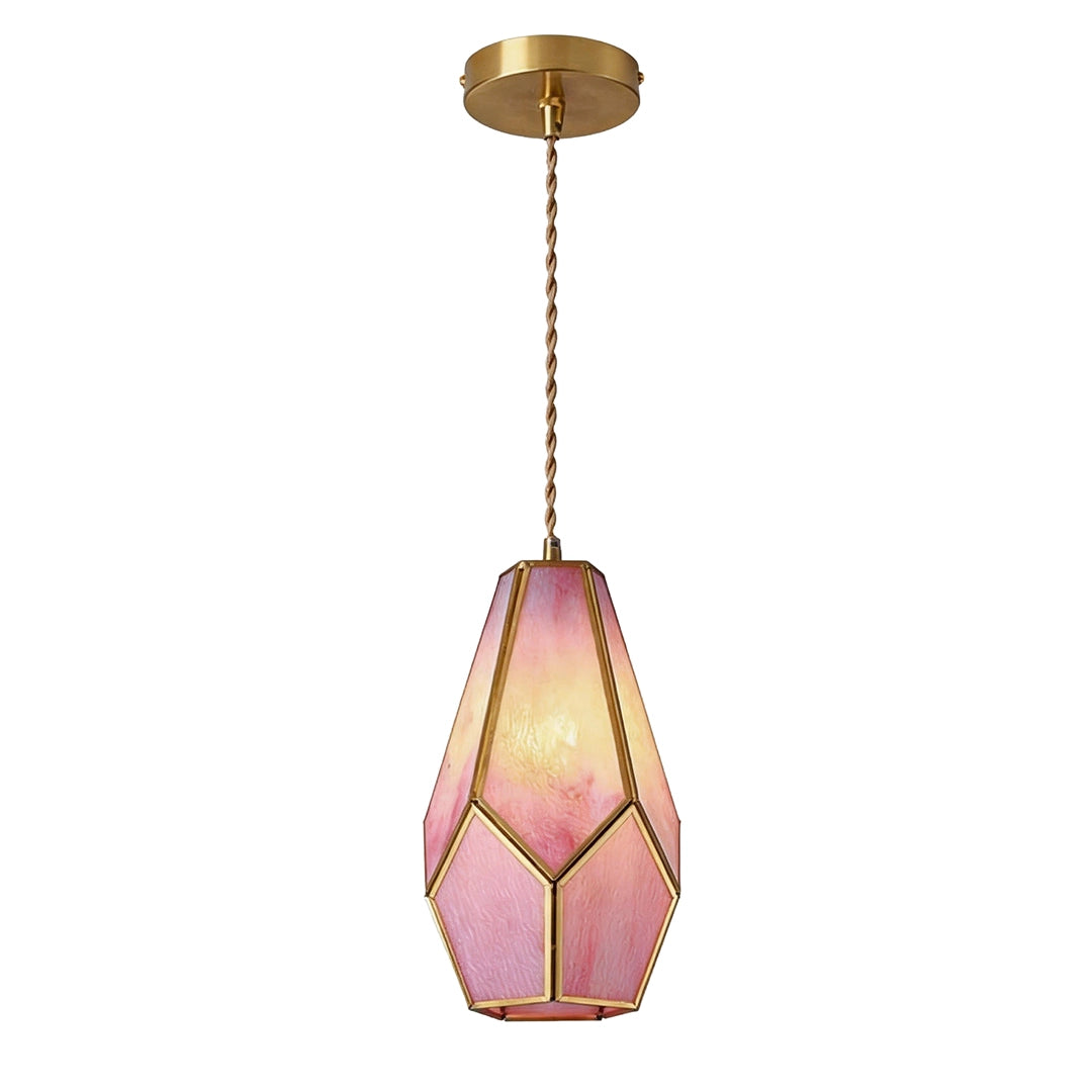 Geometric pendant light with a pink glass shade and gold frame shown on white.