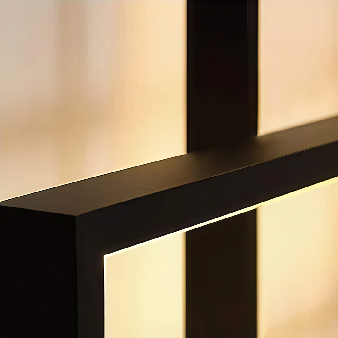 geometric-wall-sconce-black-gold-close-up-overlapping-frames