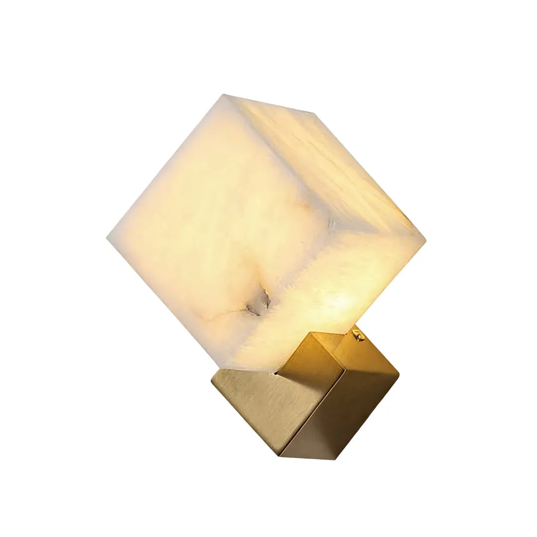 Geometric wall sconce product image with a glowing cube shade and gold angular base.