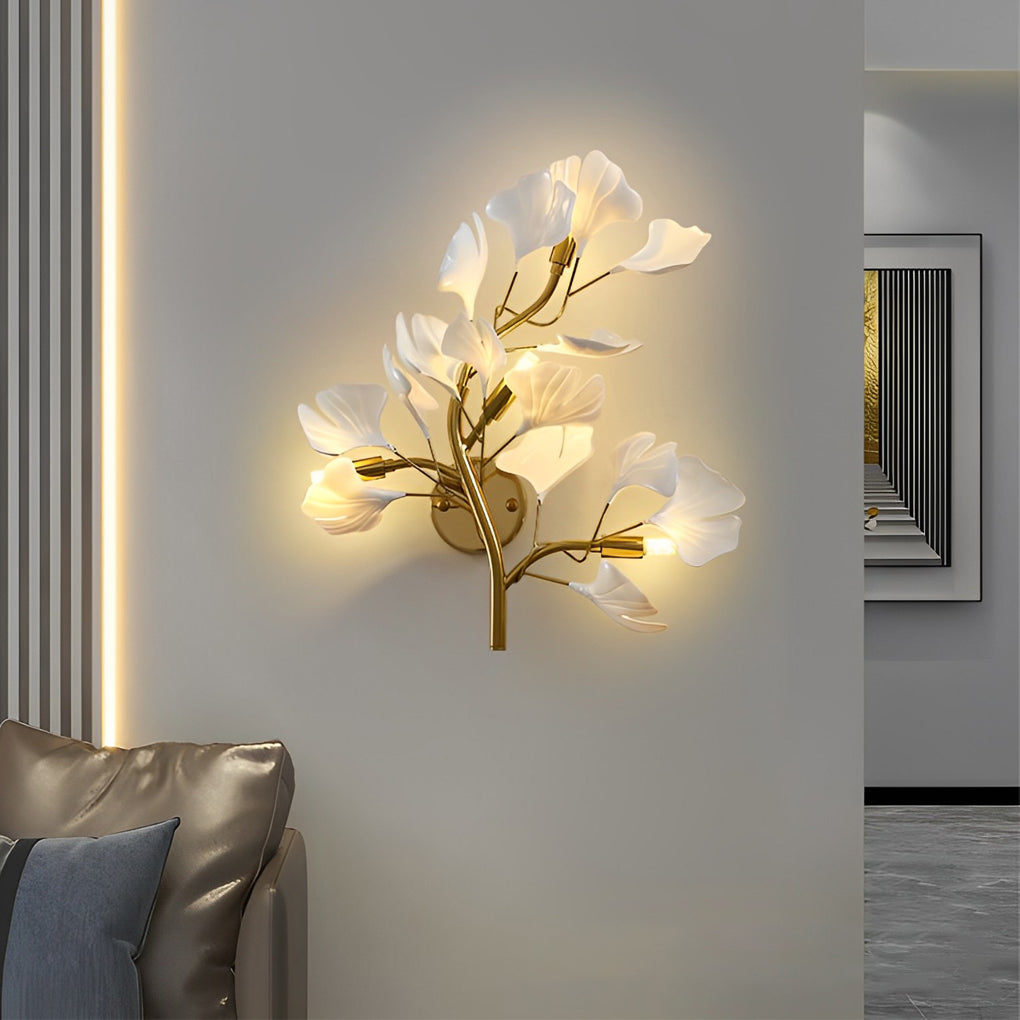 Ginkgo wall light enhancing a cozy reading nook with warm light.
