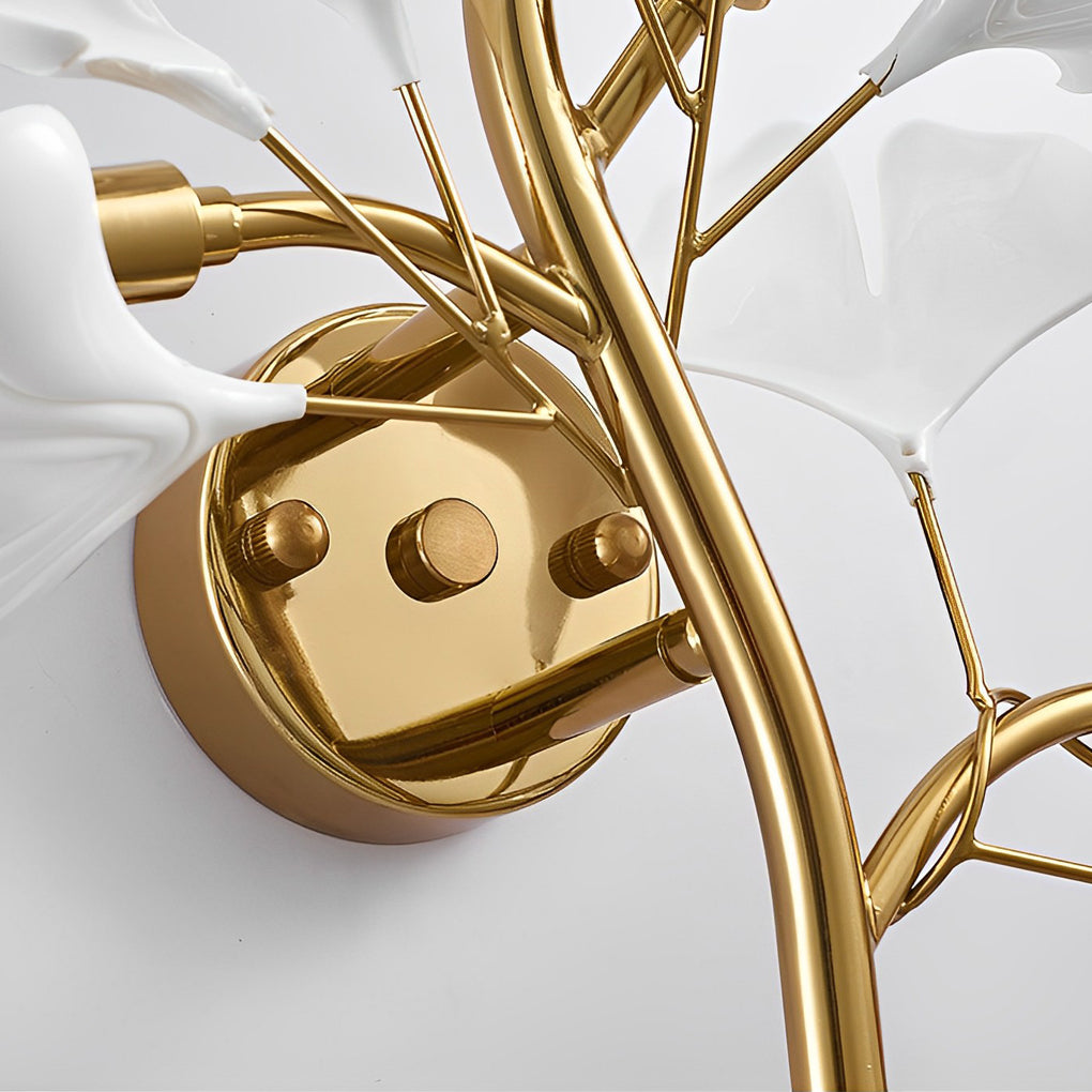 Ginkgo wall light with detailed view of its golden branches and leaves.