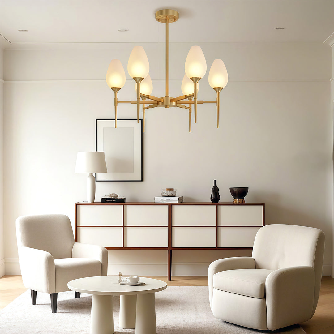 Glamorous glass modern chandelier with glass shade chandelier styling providing elegant focal point above contemporary dining console.
