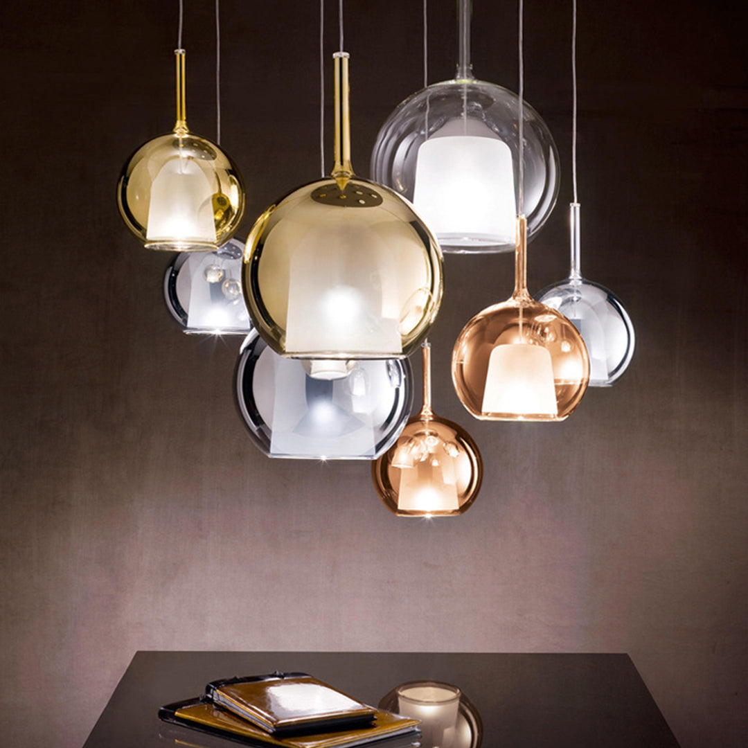 Glass ball pendant light fixture in a modern living space, providing a warm and inviting atmosphere.