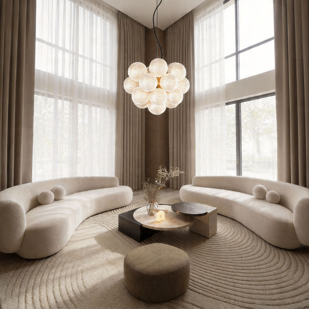 Modern glass ceiling light in living room with clustered globe design.