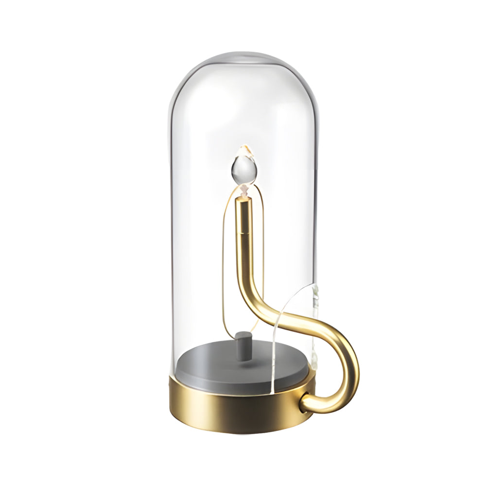 Glass dome table light in brass, front view of the artistic design.