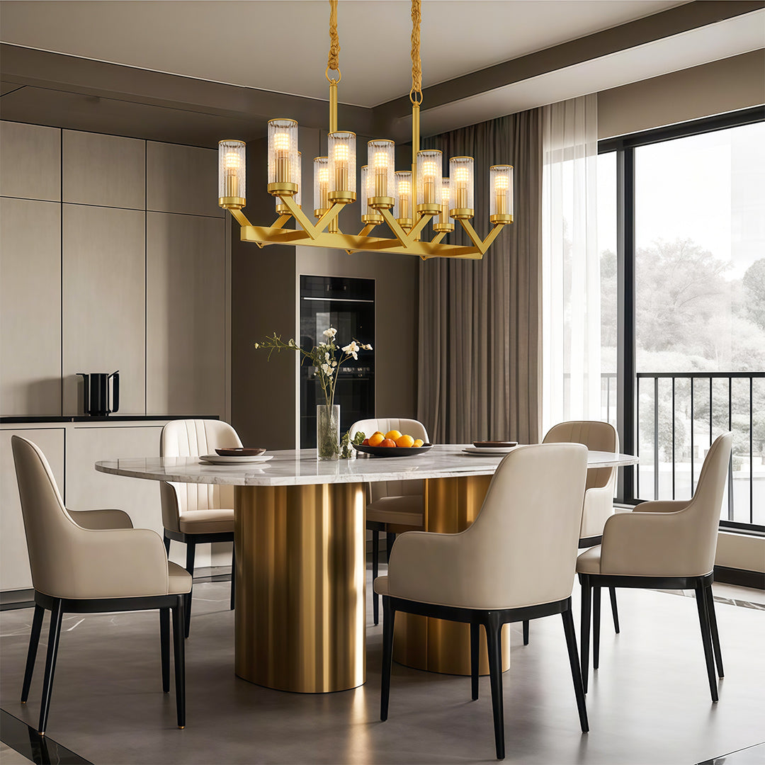 Modern luxury chandeliers enhancing contemporary dining room with brass table and neutral seating