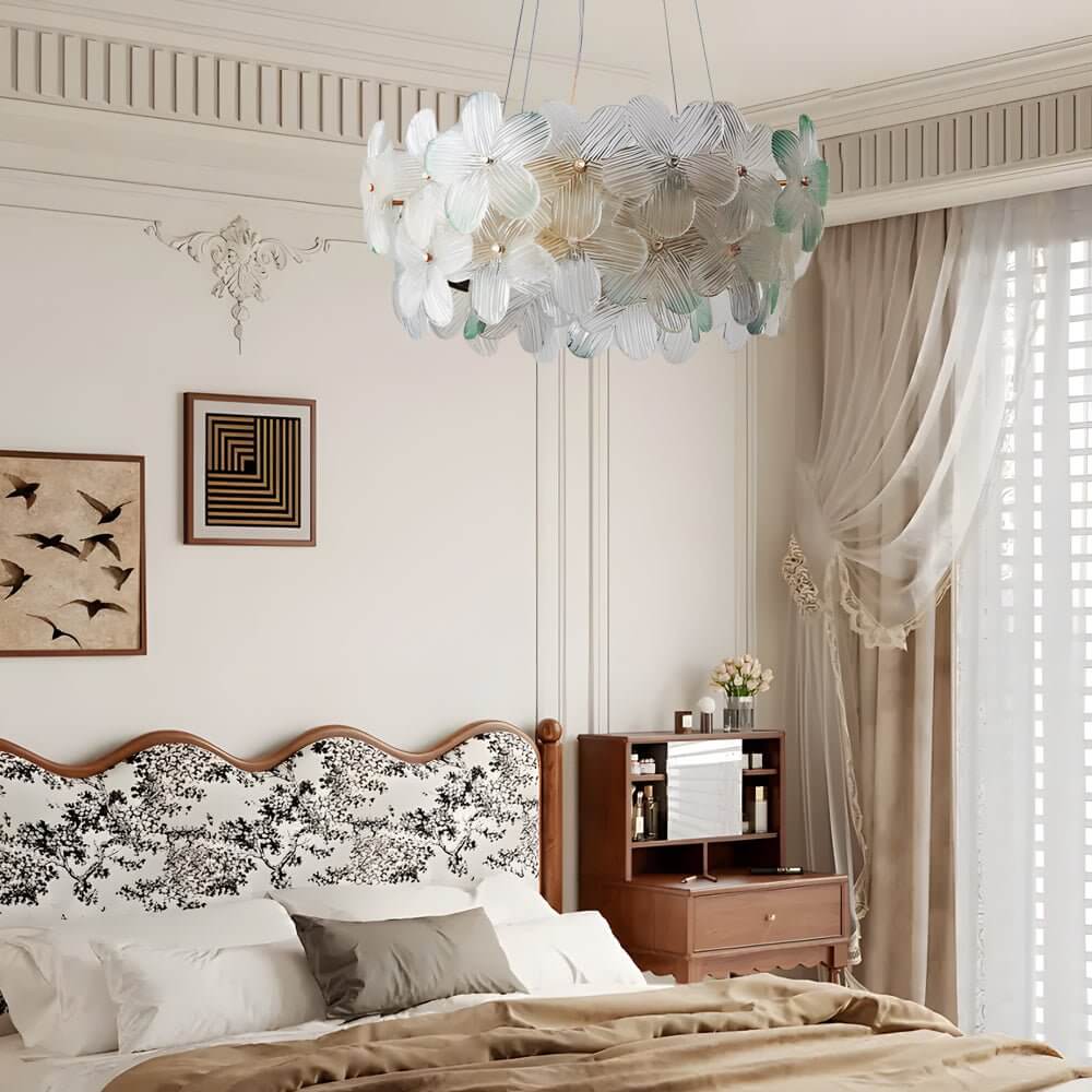 Glass flower chandelier with a close-up of its pastel glass petals and light.