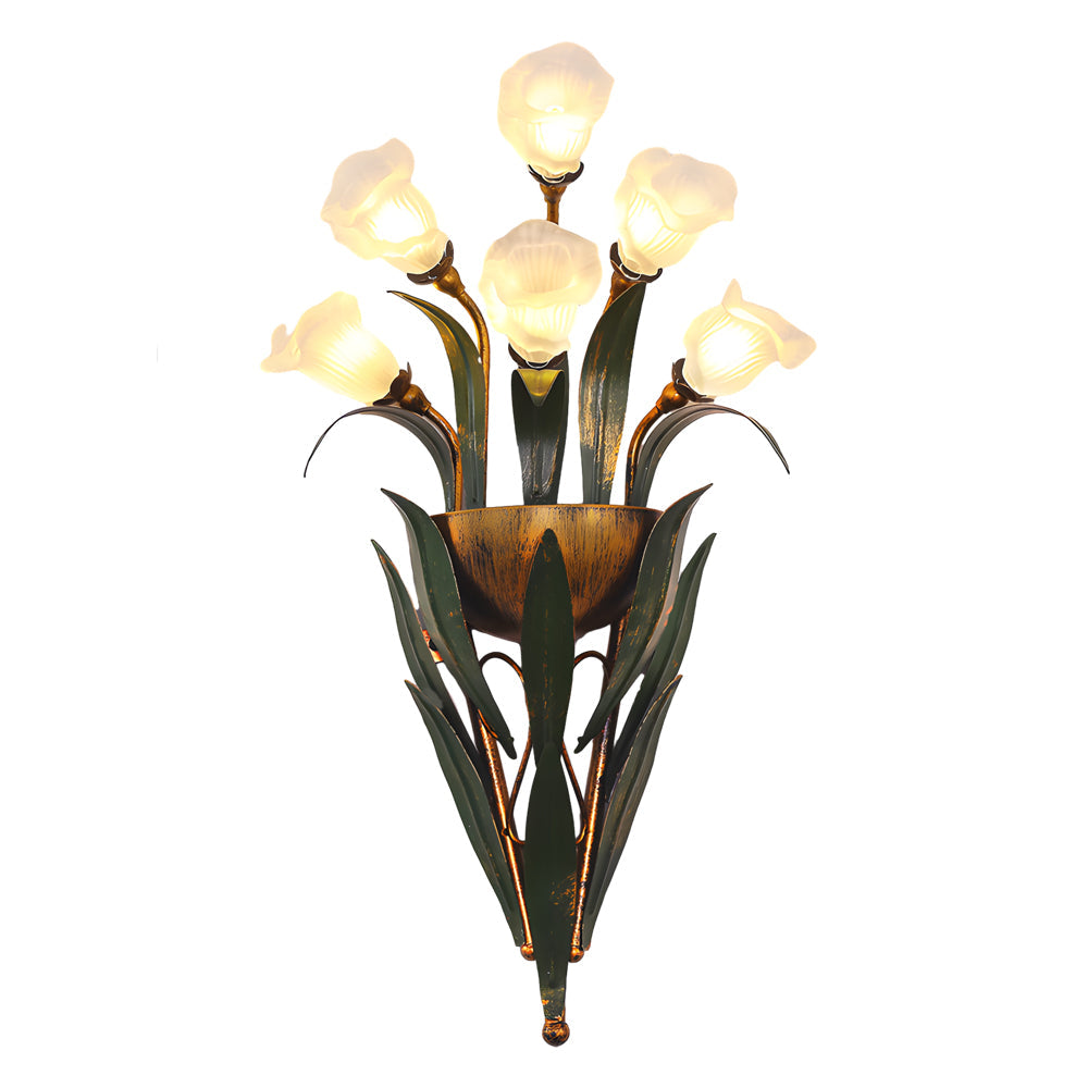 Glass flower sconce with white flowers, providing soft lighting in a contemporary interior.